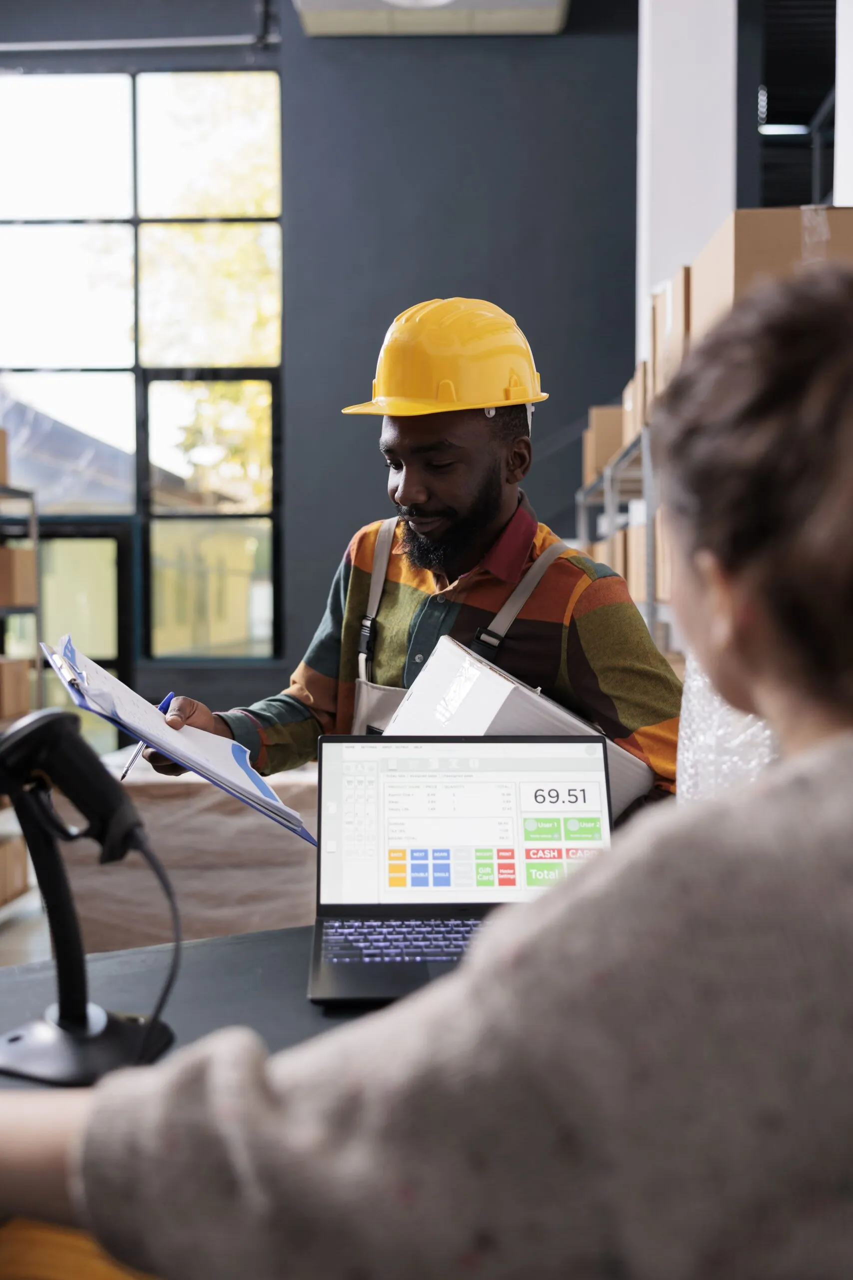 african-american-employee-discussing-merchandise-checklist (1)