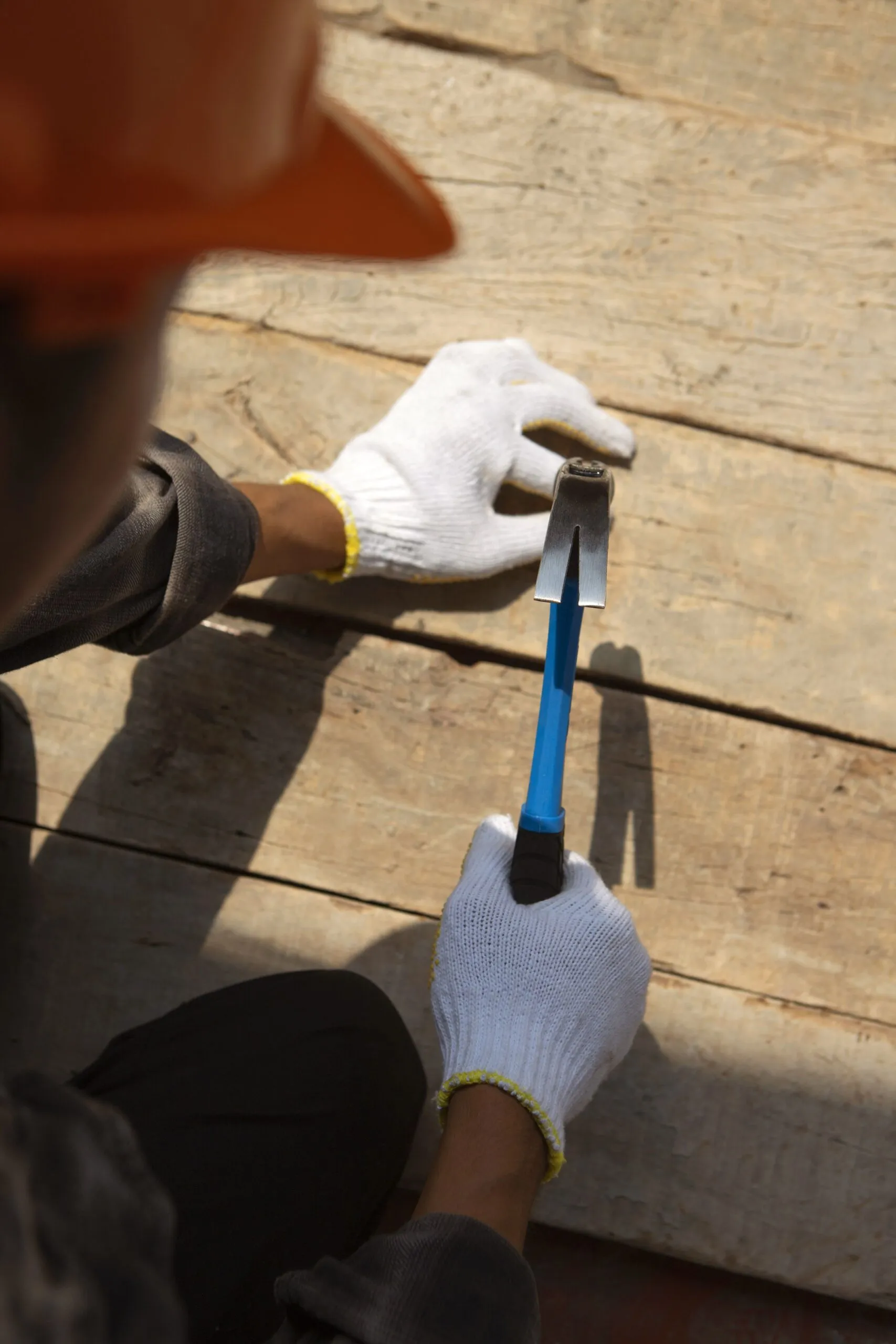construction-worker-using-hammer-job-site (1)